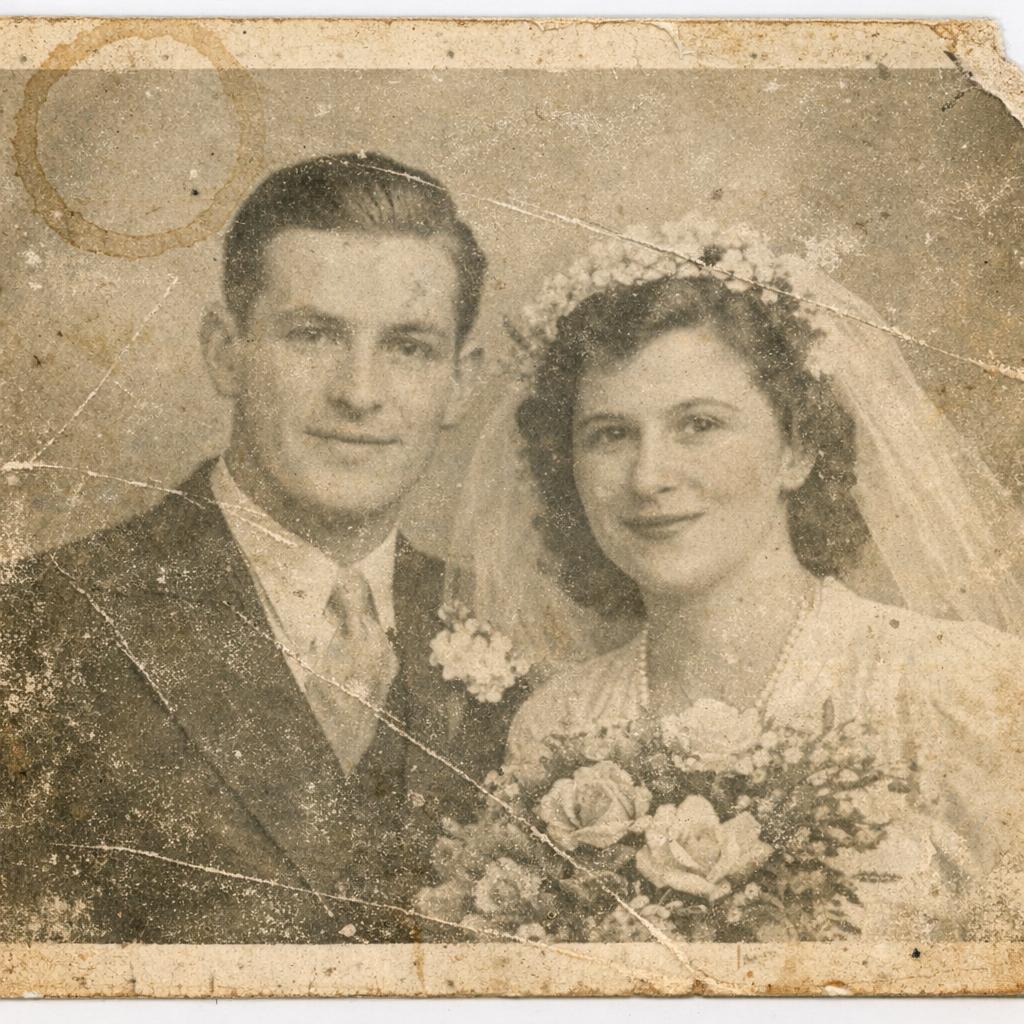 Faded Black & White Portrait — before AI restoration