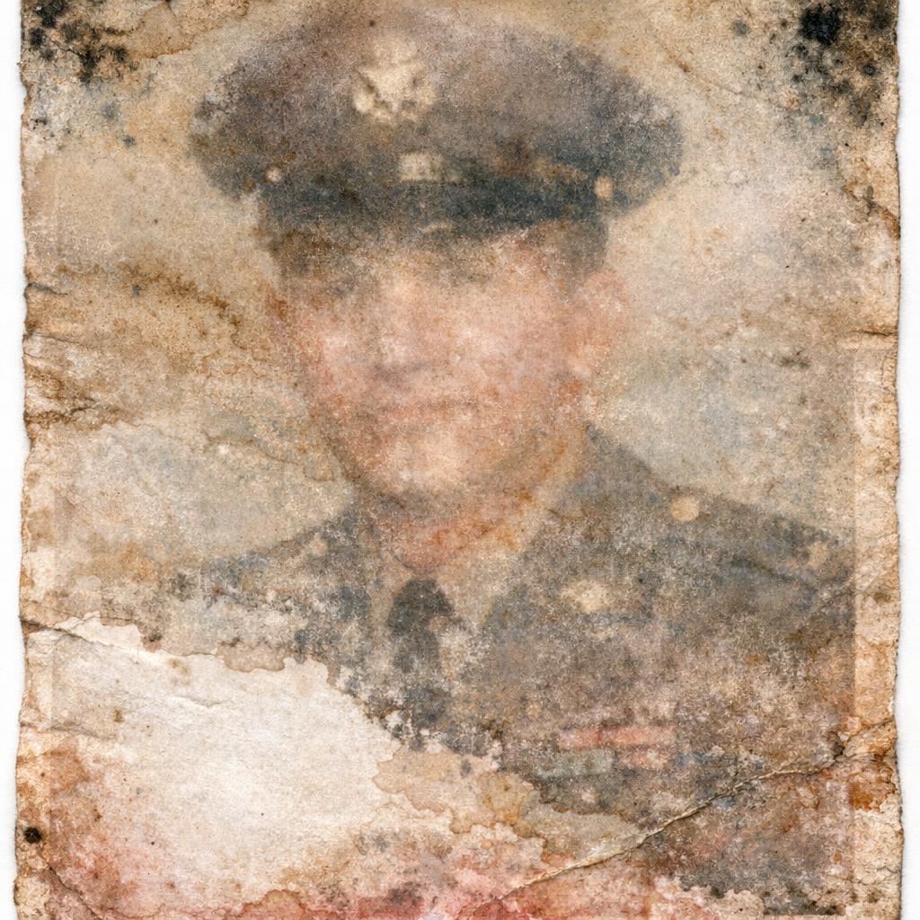 Water-Damaged Portrait — before AI restoration