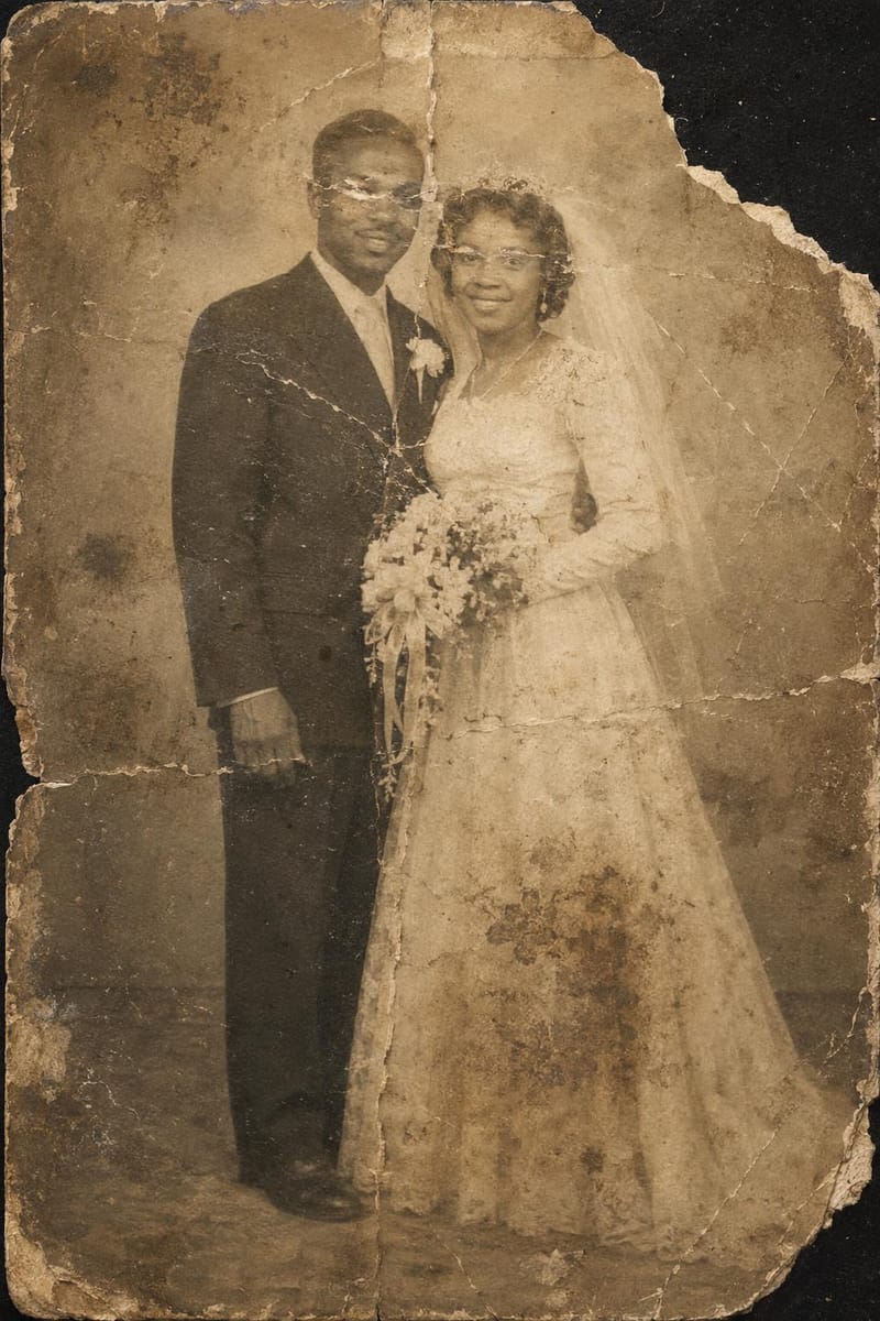Damaged original — Restored 1952 wedding portrait of Theodore's parents
