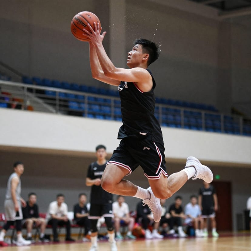 Basketball player mid-jump